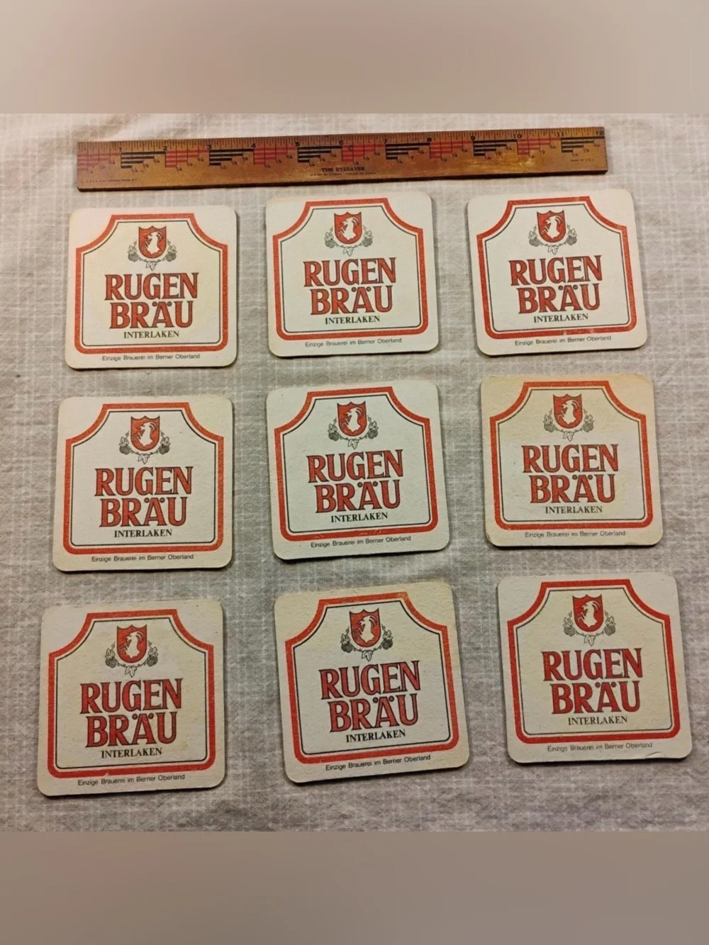 Set of 12 Rugan Brau Beer Mats, Switzerland Scenes